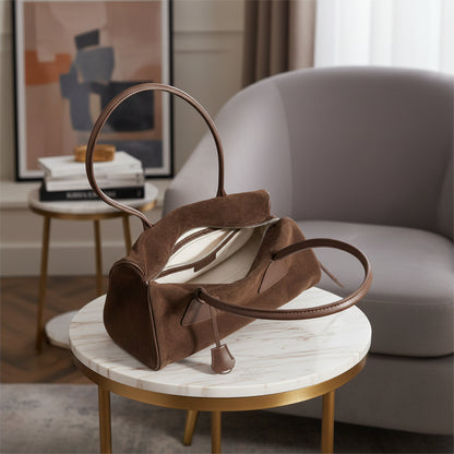 L'intérieur du sac bandoulière en cuir et daim 2 en 1