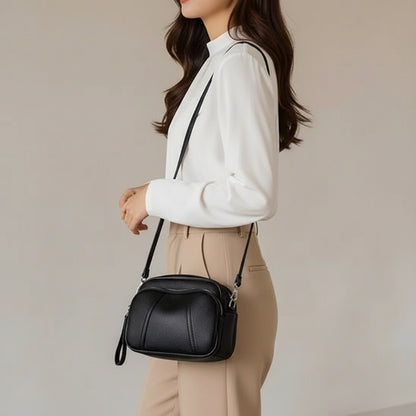 Sac bandouliere porté à l'épaule