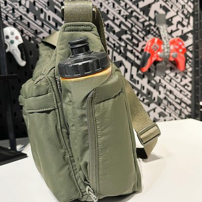 Vue sur la poche latérale extensible du sac pour ordinateur Confort & Pratique
